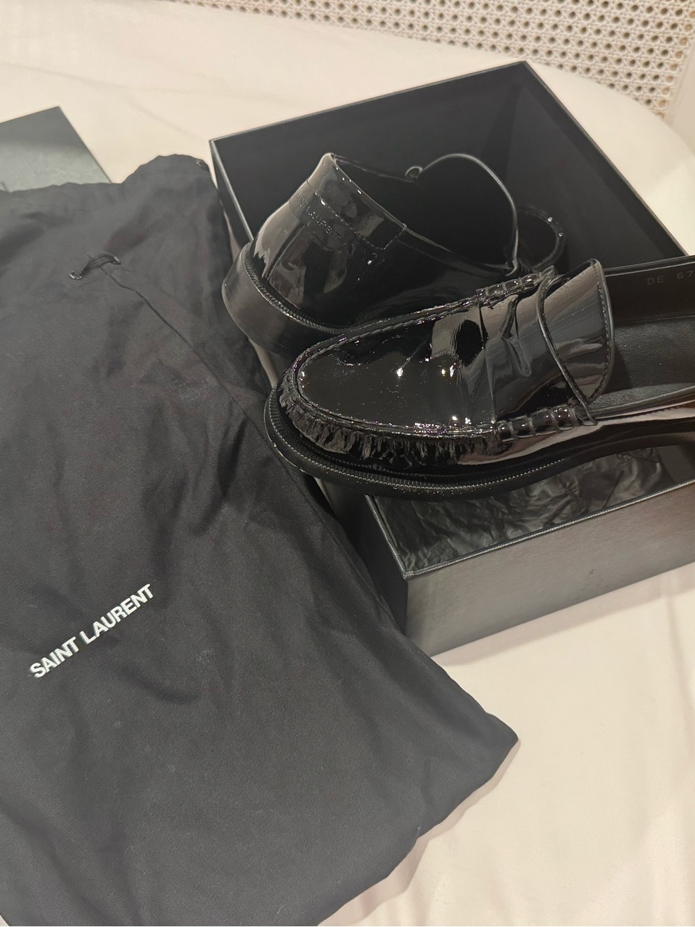 Saint Laurent Woman’s Black Patent Leather Penny Loafers